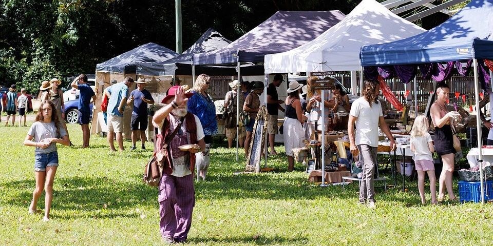 Families, visitors and local stallholders at the Kin Kin market